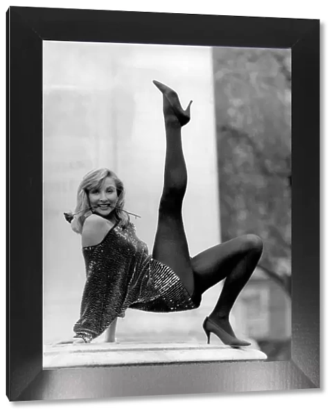 Clothes Stockings: Model Kate wears Black Velvet stockings by Charnos retailing at £