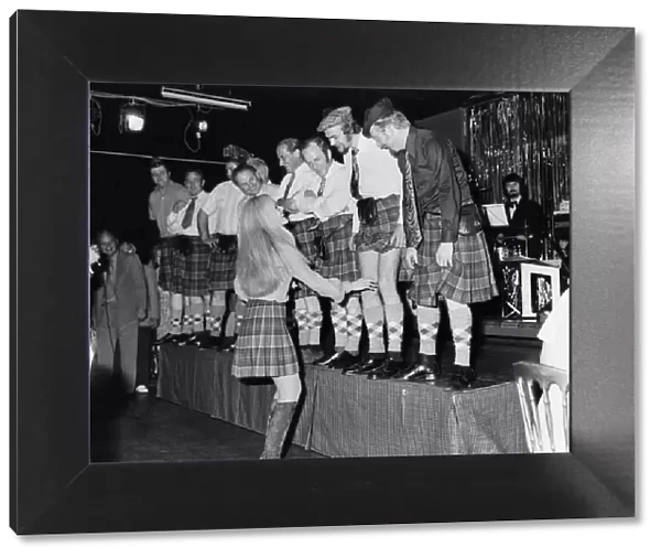 Off with their trousers! A line-up of phoney Scots in the Caledonian Suite night club