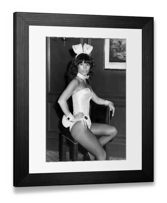 Framed Print : Nightclubs. A bunny girl sitting on a chair. July 1978 P018477 Framed Print : Nightclubs. A bunny girl sitting on a chair. July 1978 P018477