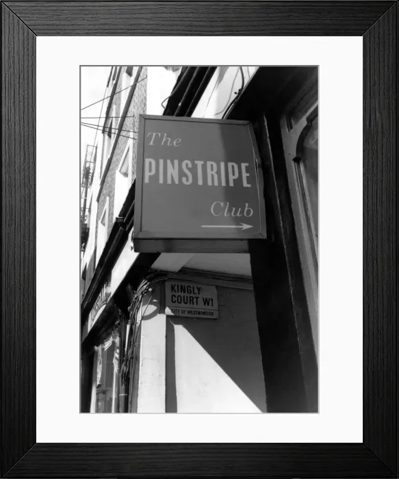 Framed Print : Sign at the entrance to the Pinstripe Club. May 1990 P018537