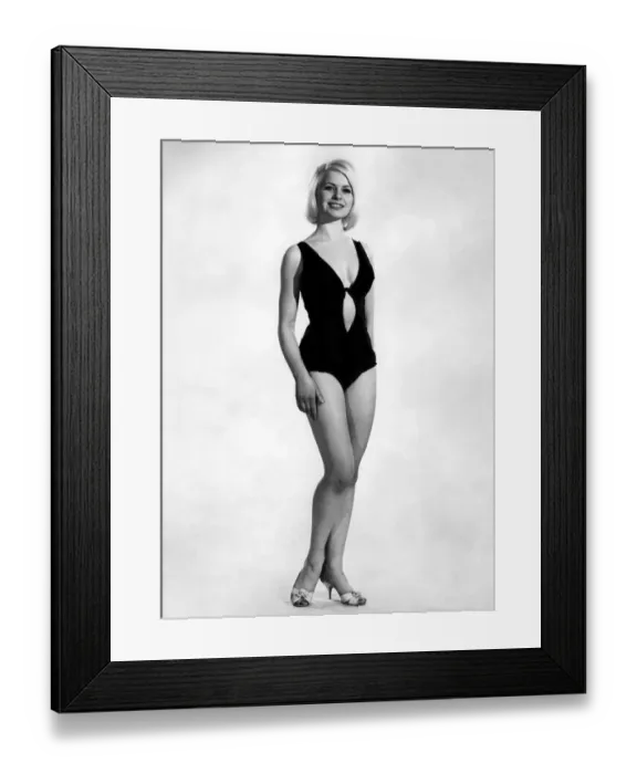 Framed Print : Clothing Beach. Vyvyan Dunbai models a one piece swimming costume and shoes Framed Print : Clothing Beach. Vyvyan Dunbai models a one piece swimming costume and shoes