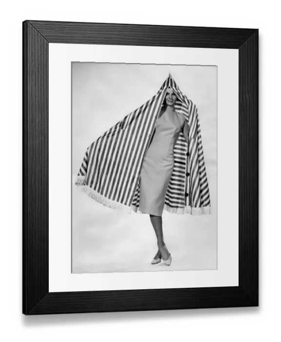 Framed Print : Clothing Beach 1963. Model Merril Weston wears a calf-length dress and shoes
