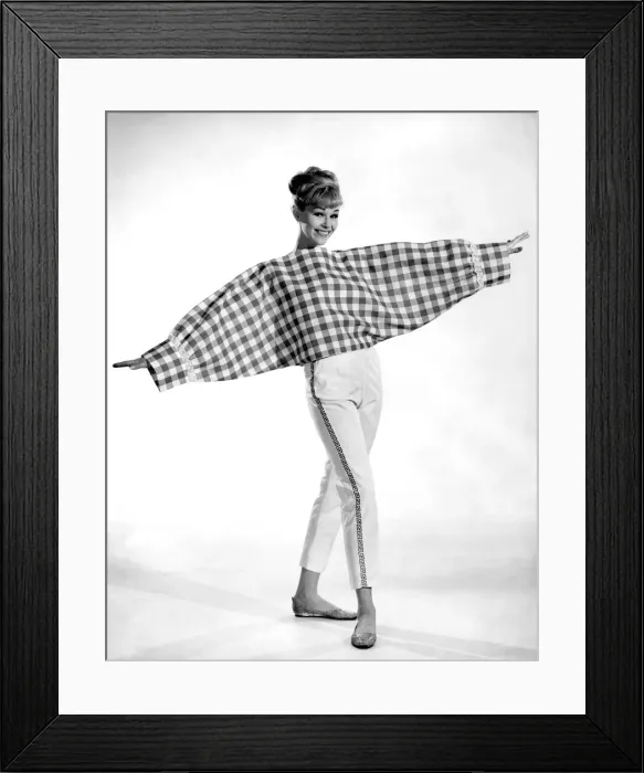 Framed Print : Clothing Beach. The checked bolster blouse looks like a pair of giant sleeves Framed Print : Clothing Beach. The checked bolster blouse looks like a pair of giant sleeves