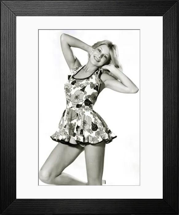 Framed Print : Clothing Beach. Woman models halterneck floral mini sun dress. February 1975 P018039 Framed Print : Clothing Beach. Woman models halterneck floral mini sun dress. February 1975 P018039