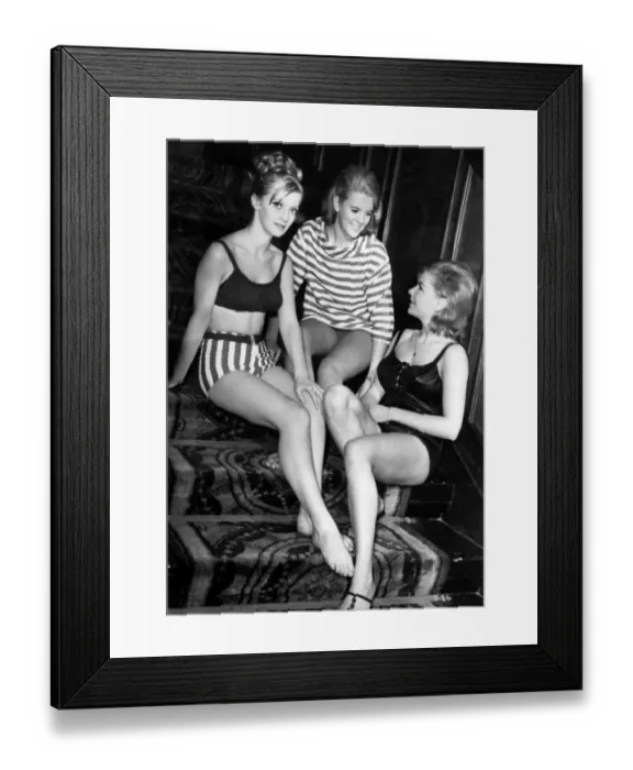 Framed Print : Clothing Beach. Three girls who are wearing 1964 swim suits are (L to R Framed Print : Clothing Beach. Three girls who are wearing 1964 swim suits are (L to R