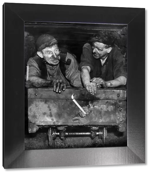 Coal miners at Rochdale pit on a mine cart. October 1947 P018219