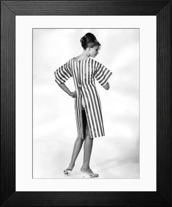 Framed Print : Clothing Beach. Striped beach dress with open back. July 1964 P017997 Framed Print : Clothing Beach. Striped beach dress with open back. July 1964 P017997