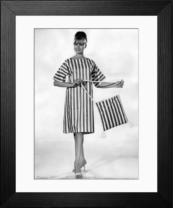 Framed Print : Clothing Beach. Striped beach dress and matching bag. July 1964 P017999
