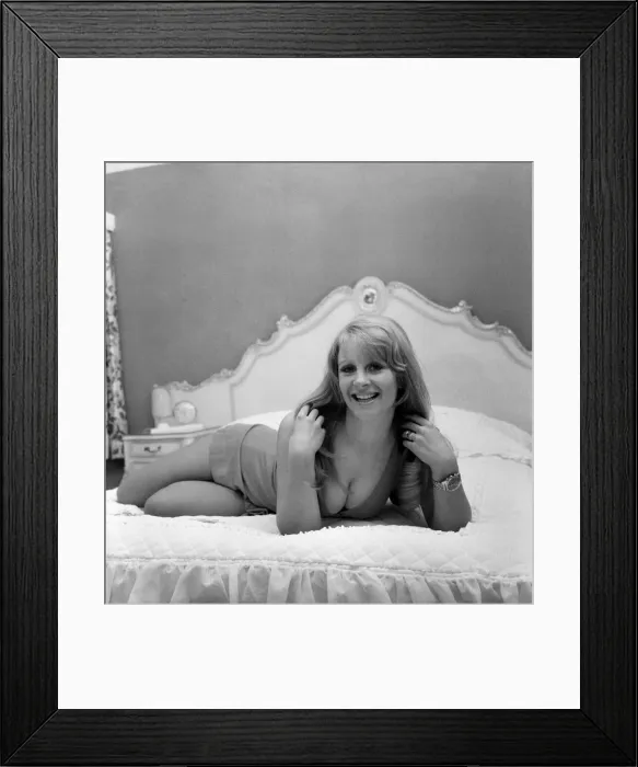 Framed Print : Woman posing in her home. November 1969 Z11399-002