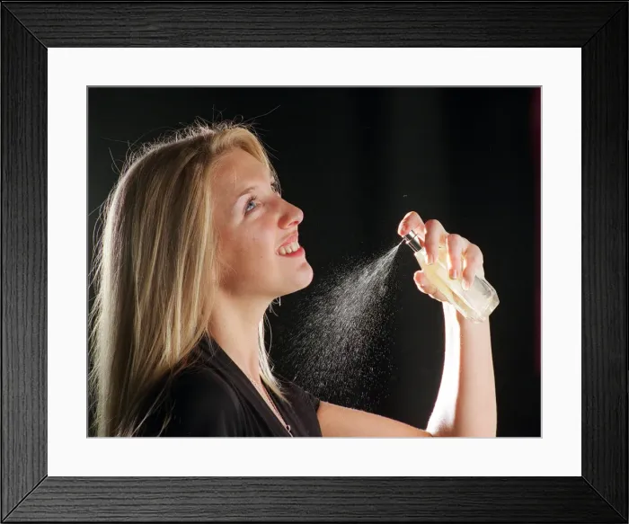 Framed Print : PERFUME TESTING Feature December 1998 Erin Gavin with scent spraying on perfume