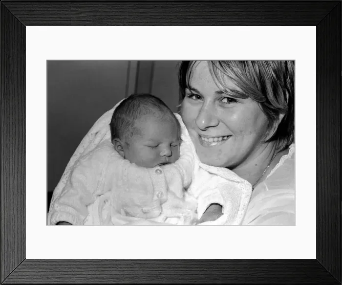 Framed Print : Families: Unusual: Mother and father with new born baby boy, after a 12 month pregnancy