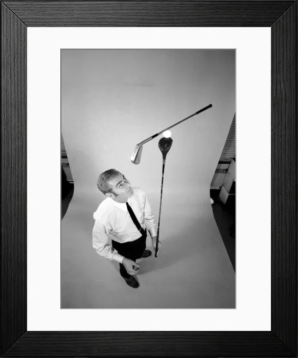 Framed Print : Entertainment: Juggling: Juggler Rob Murray doing his thing with three golf clubs