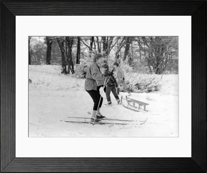 Framed Print : Weather snow scenes at Hampstead Heath. Winter: A skin enthusiast tries out the slopes Framed Print : Weather snow scenes at Hampstead Heath. Winter: A skin enthusiast tries out the slopes