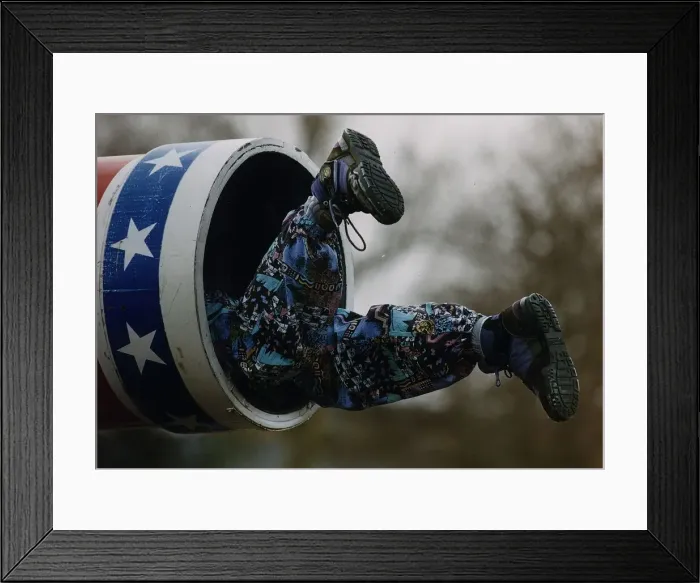 Framed Print : Eddie Edwards Ski-Jump superflop climbs into a cannon head first