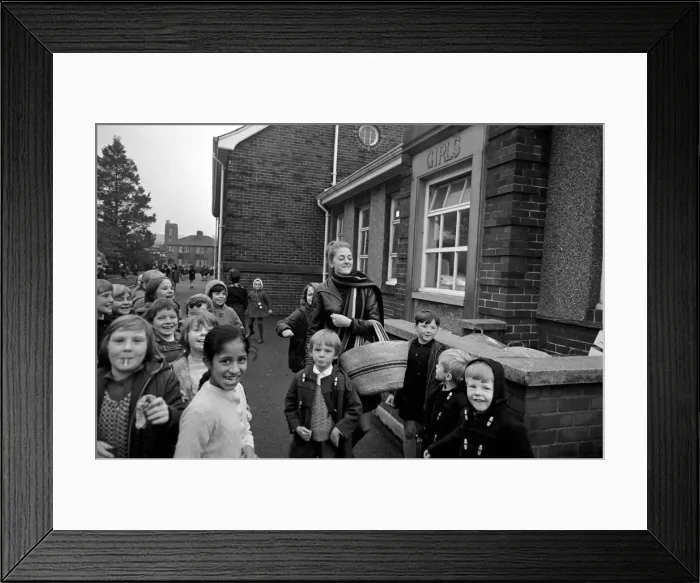 Framed Print : Clitheroe School Strike. Teacher Miss Kianne Kay surrounded by pupils as she returns to Framed Print : Clitheroe School Strike. Teacher Miss Kianne Kay surrounded by pupils as she returns to