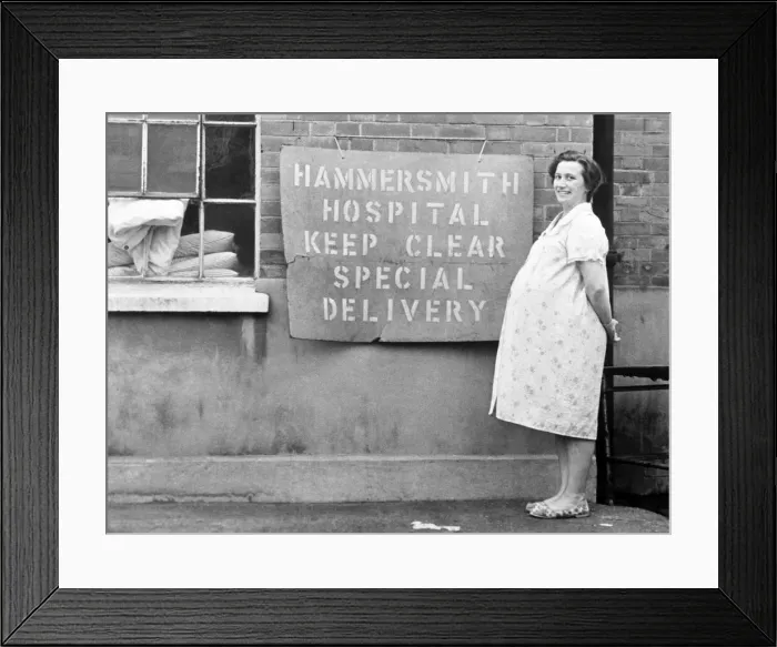 Framed Print : A woman standing at a parking space at Hammersmith Hospital. November 1969 Z11091 Framed Print : A woman standing at a parking space at Hammersmith Hospital. November 1969 Z11091