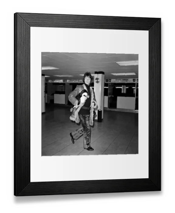 Framed Print : Film actor John Hunt left Heathrow Airport today to spend six weeks at Esperanza in