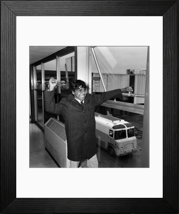 Framed Print : An aborigine teenager from Australia holding a boomerang. November 1969 Z11087-001 Framed Print : An aborigine teenager from Australia holding a boomerang. November 1969 Z11087-001