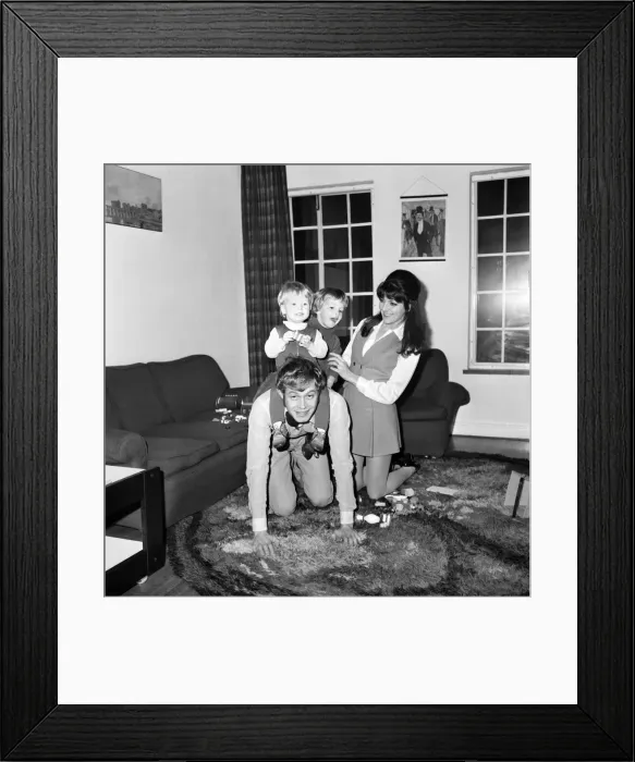 Framed Print : Families: Mother, father and children. Mother, father and children all playing Framed Print : Families: Mother, father and children. Mother, father and children all playing