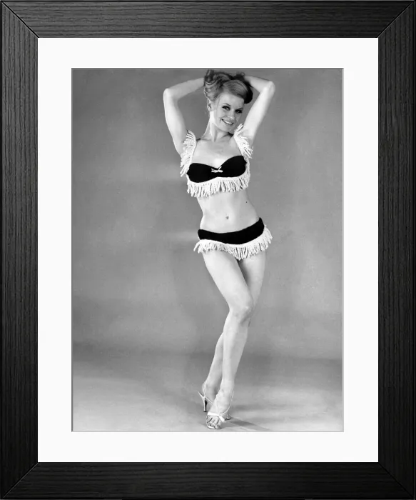 Framed Print : Woman wearing bikini outfit with tassles. April 1965 P018004 Framed Print : Woman wearing bikini outfit with tassles. April 1965 P018004