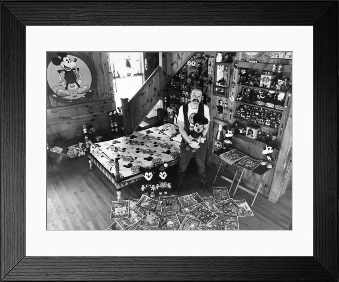 Framed Print : Collection - Mickey Mouse mania. Assistant Professor John Fawcett at his home Framed Print : Collection - Mickey Mouse mania. Assistant Professor John Fawcett at his home