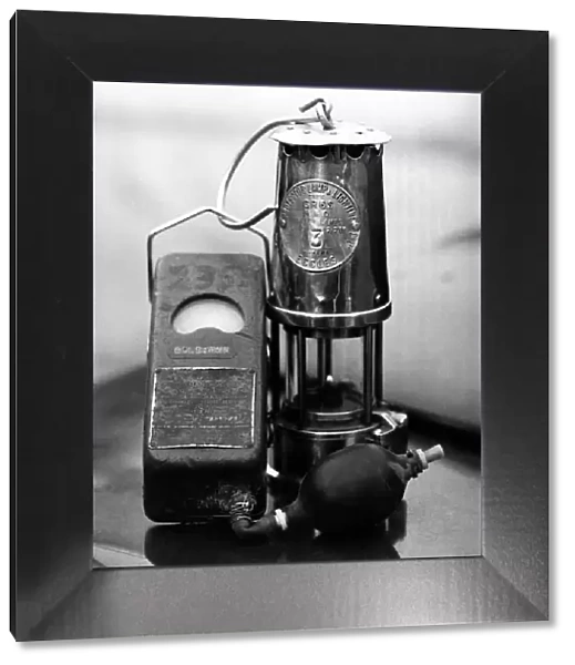 Safety lamp and meter for use in a coal mine. March 1979 P017735