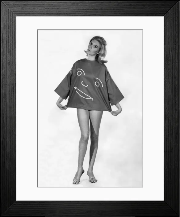 Framed Print : This Happy Face'shirt is the talk of the beaches. In brick red sailcloth Framed Print : This Happy Face'shirt is the talk of the beaches. In brick red sailcloth