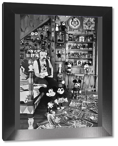Collections. Mickey Mouse mania. Assistant Professor John Fawcett at his home