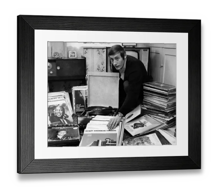 Framed Print : Mr. Colin Tustin at home in Hythe Bridge St. Oxford seen cleaning some of his 486 long