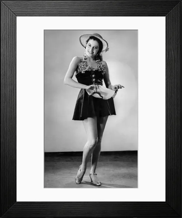 Framed Print : Woman wearing short summer dress and hat December 1937 P017656 Framed Print : Woman wearing short summer dress and hat December 1937 P017656