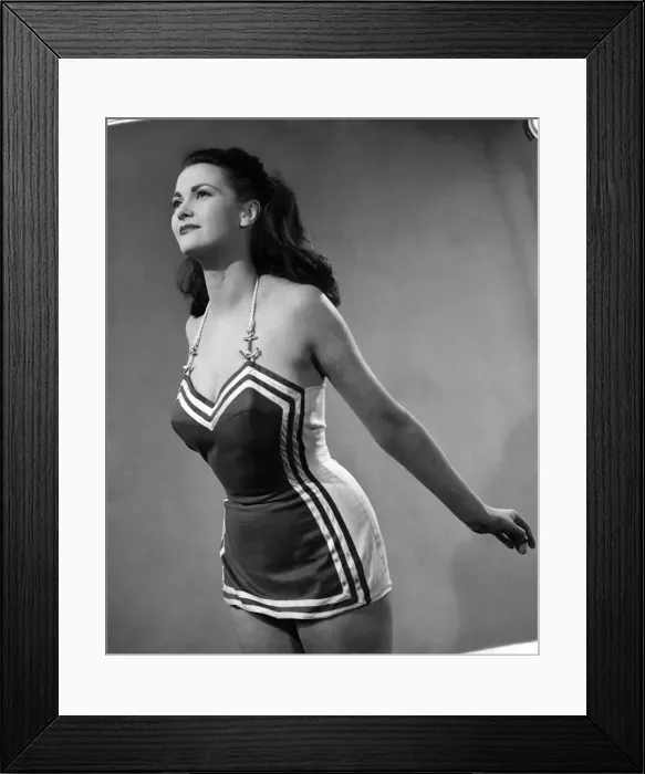 Framed Print : Woman wearing one piece swimsuit April 1952 P017651