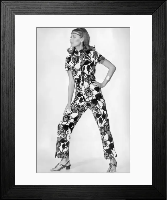Framed Print : Brightening up the beach scene-the jumpsuit, colourful in bold flower prints Framed Print : Brightening up the beach scene-the jumpsuit, colourful in bold flower prints