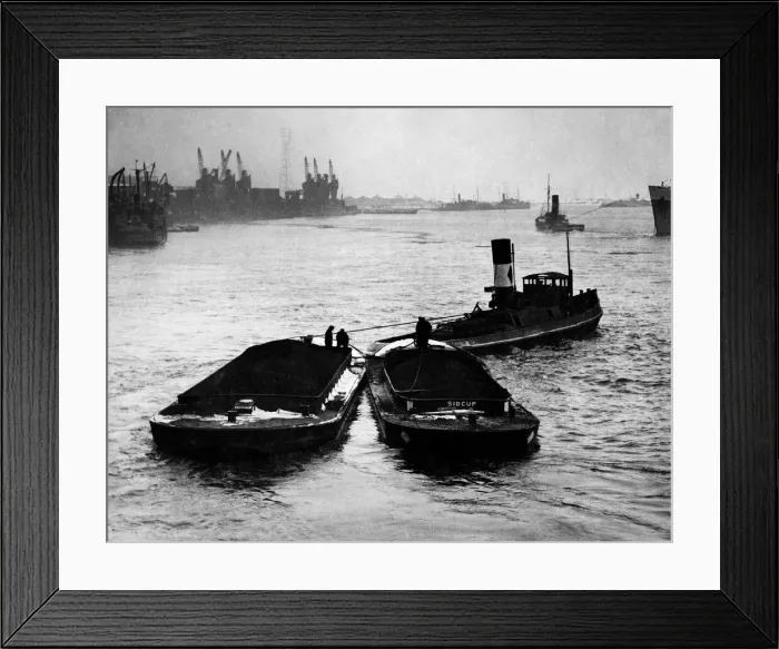 Framed Print : Coal arriving by boat iat a dockyard. February 1947 P017677