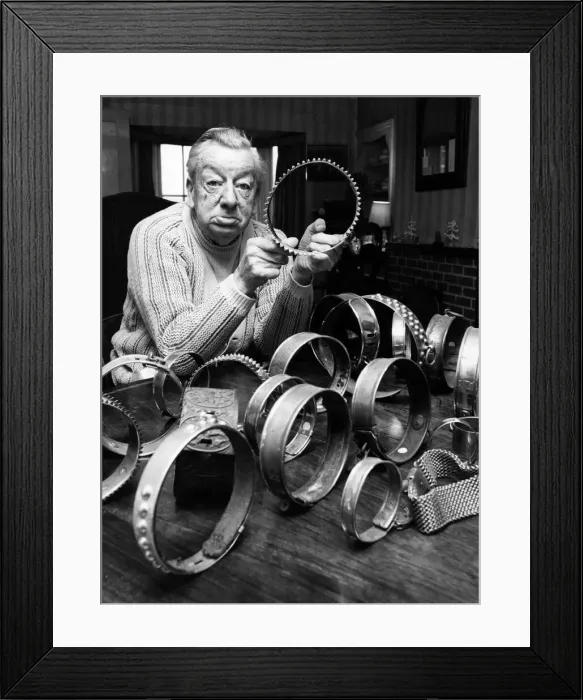 Framed Print : The collectors. Priceless. Gordon Wigg, 71 has a marvellous collection of 83 dog