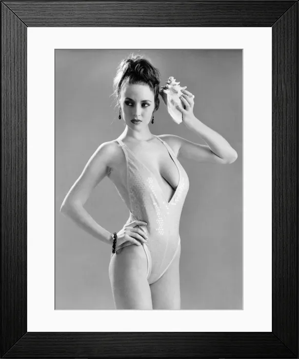 Framed Print : Woman wearing one piece swimsuit February 1986 P017667