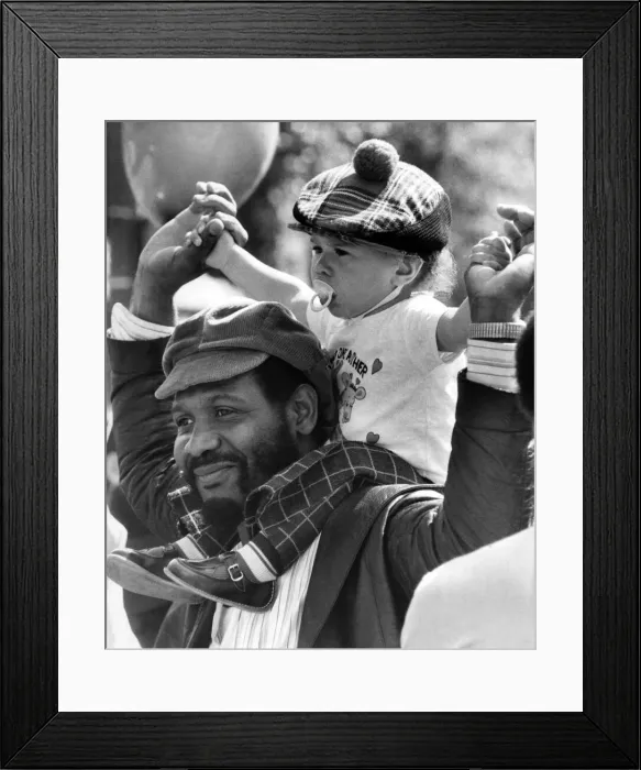 Framed Print : Thugs spoil carnival fun. It was a day when black and white people were supposed to play