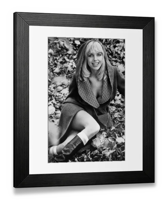 Framed Print : Fashions - 1970s. Button up your overcoat. Store boss Irvine Sellars is giving