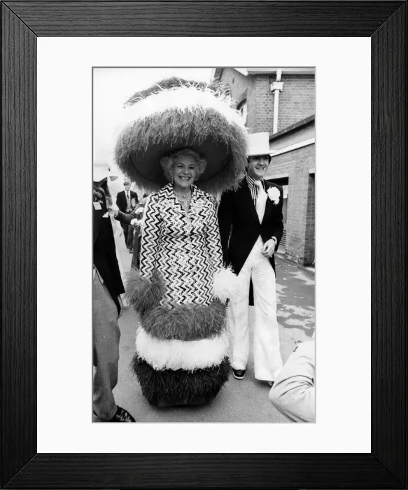 Framed Print : Ascots Mad Hatter'Mrs. Gertrude Shilling arrives at the races with her