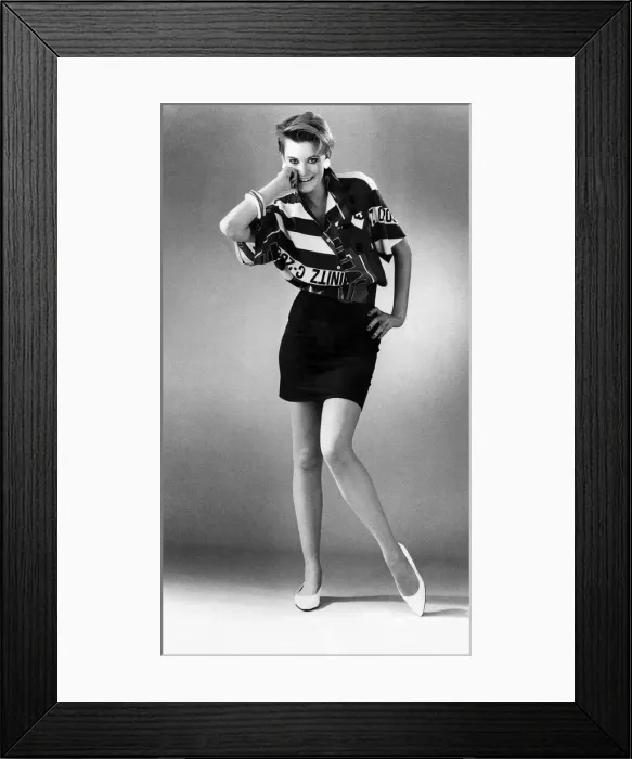Framed Print : Model wearing a bowling shirt in khaki, orange and red and mini Framed Print : Model wearing a bowling shirt in khaki, orange and red and mini
