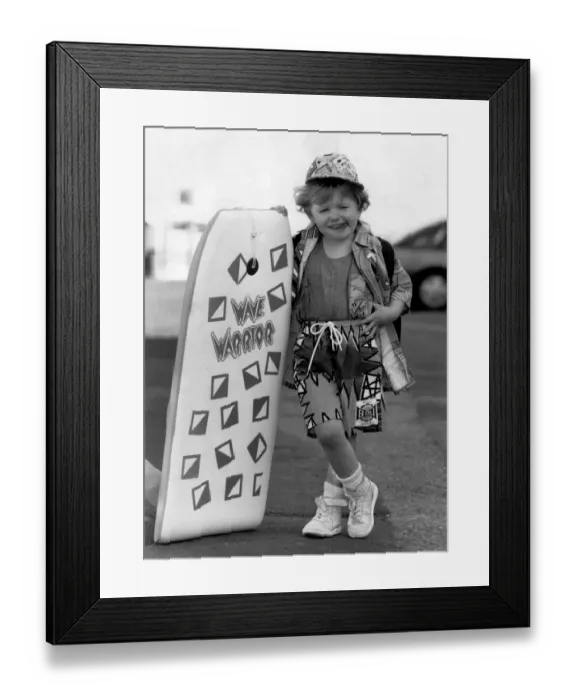 Framed Print : Fashion - Beachwear: Whizkid on the board. Shes barely bigger then the board Framed Print : Fashion - Beachwear: Whizkid on the board. Shes barely bigger then the board