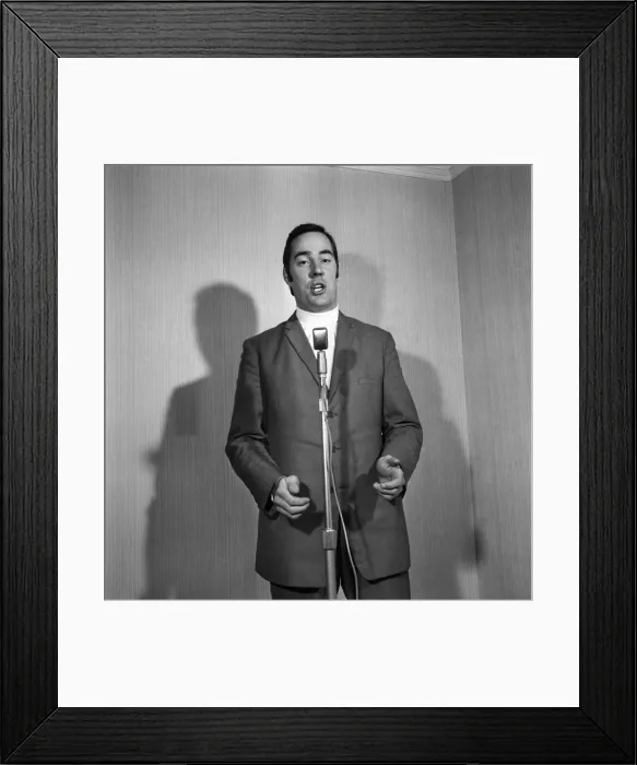 Framed Print : A man wearing a suit singing into a microphone. November 1969 Z10935-021