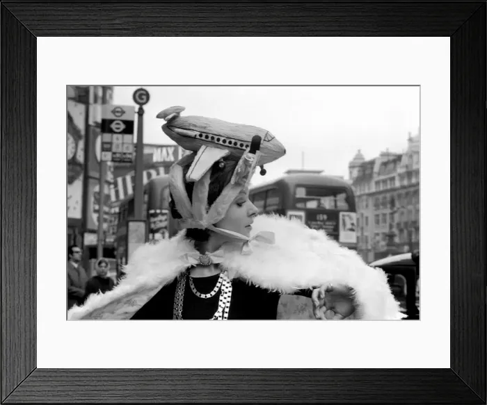 Framed Print : Fashions of the 11th Annual Poultry Feather Hat Competition were being shown at the CafAoe Framed Print : Fashions of the 11th Annual Poultry Feather Hat Competition were being shown at the CafAoe