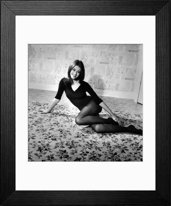 Framed Print : Picture of professional model Miss Jan De Fraine, aged 21 lying down wearing black top