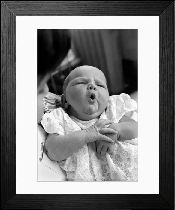 Framed Print : Baby girl yawns in the childrens hospital in Myrtle street, Liverpool Framed Print : Baby girl yawns in the childrens hospital in Myrtle street, Liverpool