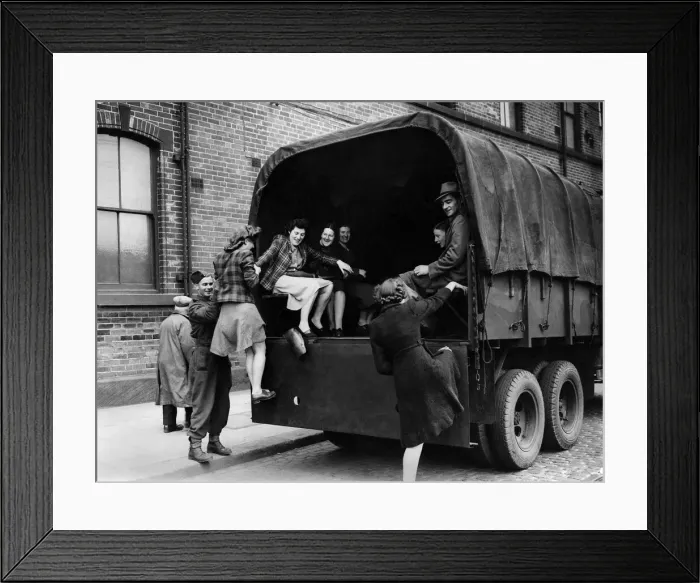 Framed Print : South York tram strikes. Girl munition workers being helped into an army lorry Framed Print : South York tram strikes. Girl munition workers being helped into an army lorry