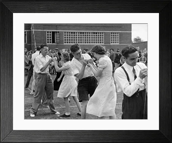 Framed Print : Munition workers sports: The needle threading competition proved the men experts during Framed Print : Munition workers sports: The needle threading competition proved the men experts during