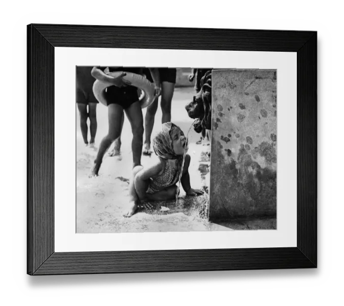 Framed Print : Finchley Swimming Pool. Straight from the lions mouth this little girl cools down