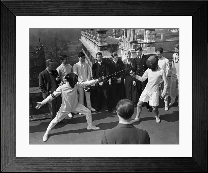 Framed Print : On Guard! Squadron Leader Charles de Beaumont Schaulbey Fencers on roof of London Framed Print : On Guard! Squadron Leader Charles de Beaumont Schaulbey Fencers on roof of London
