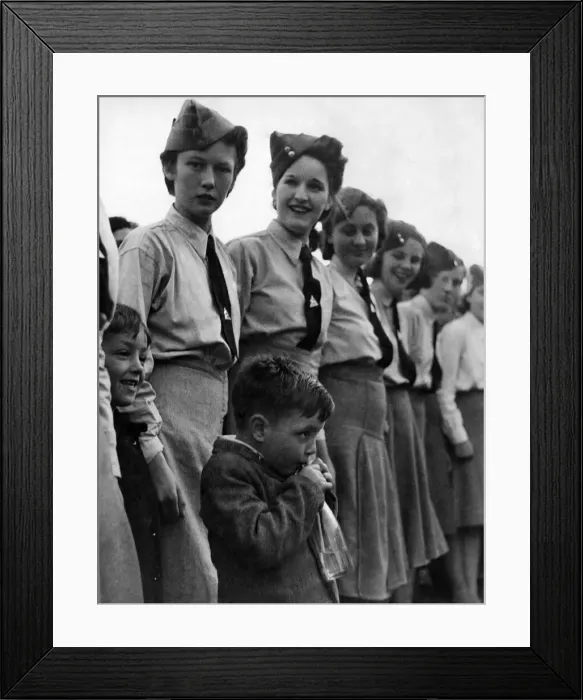 Framed Print : Small boy busily engaged drinking ginger pop while watching the prize giving