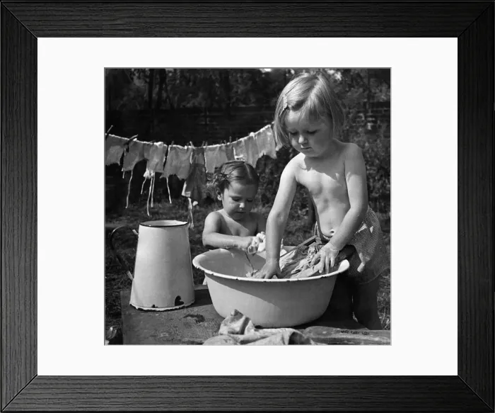 Framed Print : Helping to wash the smalls. Ann Dowling aged 4 and Pauline Carey aged 2 1  /  2